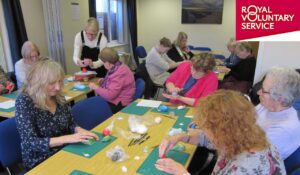 People enjoying a crafting session