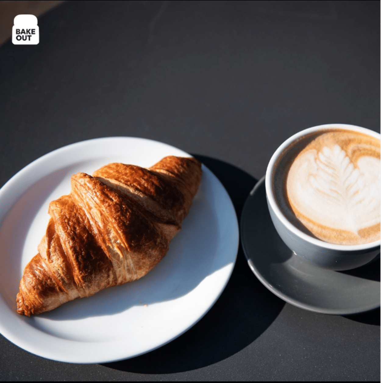croissant and a cup of coffee